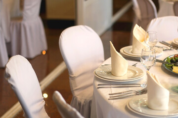 Table set for festive occasion. Selective focus.