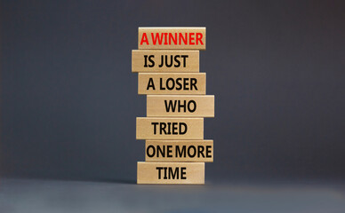 Winner or loser symbol. Wooden blocks with words A winner is just a loser who tried one more time. Beautiful grey background, copy space. Business, winner or loser concept.