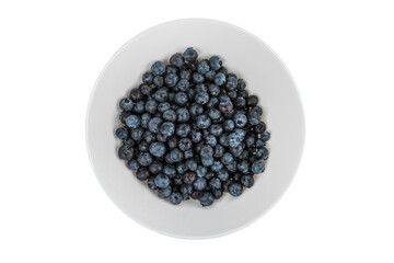 Ripe blueberries in a white plate. isolated on white background.