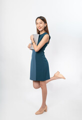 Photograph of a young, beautiful and sexy asian Thai lady model in professional business attire with a tablet on hand