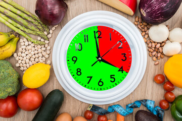 Healthy food around a circular clock with a wooden background.