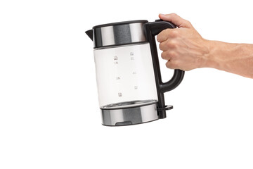 A hand holds a glass, electric, modern transparent kettle on a white background. Close-up.