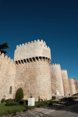 View of a tower of the Walls of Ávila in Spain. These fortifications are the most complete in all of Spain and were completed between the 11th and 14th centuries.