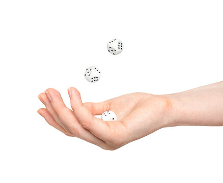dices in hand and in air isolated on white background. levitation