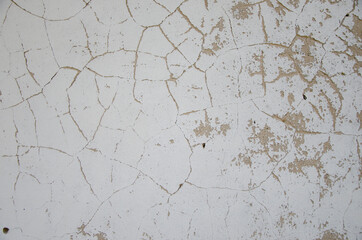 Texture of the old stucco wall. Cracked stucco wall background	