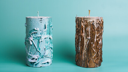 two candles on a blue background