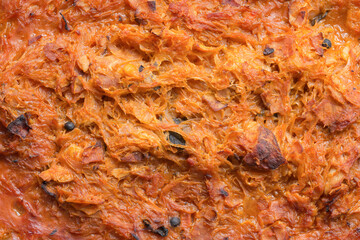 Traditional authentic Polish bigos. The meal with stewed sauerkraut, white cabbage, meat and sausage along with spices. Top view. Diet food background