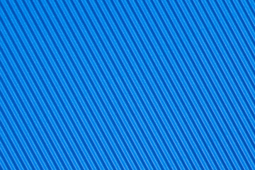The texture of corrugated cardboard craft paper - blue