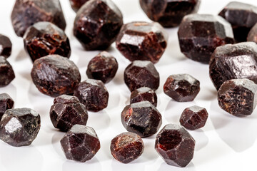 macro mineral stone  Garnet, on a white background