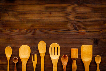 Flat lay of wooden kitchen utensils and cookware