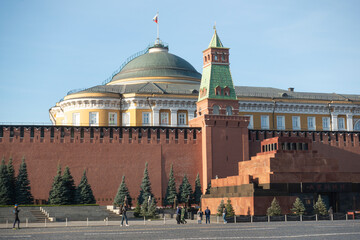 Senate Palace and Lenin's Mausoleum in the morning sun at the Kremlin wall on Red Square