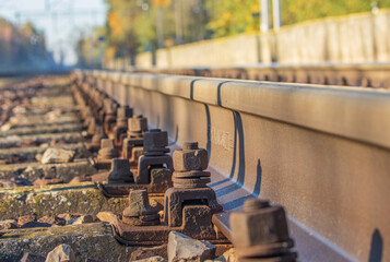 view of the rails from a low perspective, close-up of the rails and railway sleepers.