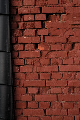 Old brown brick wall texture. Grunge background