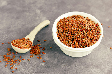 Raw and Uncooked Flaxseeds in a Bowl and Spoon, Healthy Food Photography
