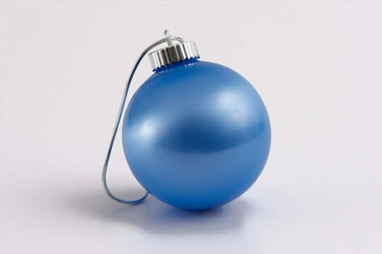 blue Christmas ball on white