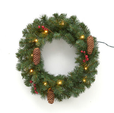christmas wreath on white with lights
