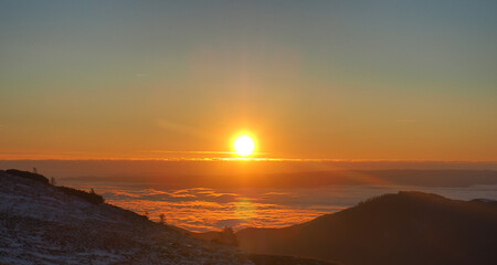 Dusk over a sea of clouds