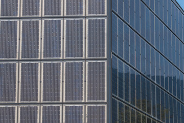 Fototapeta premium building facade covered with photovoltaic panels