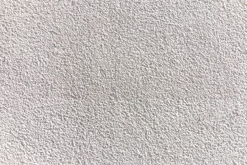  White concrete wall texture and background. White cement, grainy, plaster. Corrugated, rough surface.