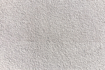  White concrete wall texture and background. White cement, grainy, plaster. Corrugated, rough surface.