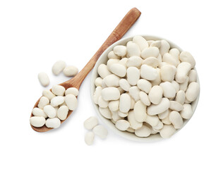 Spoon and bowl with uncooked navy beans on white background, top view