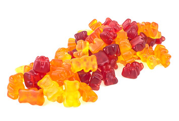 Colorful fruity flavor gummy bears isolated on a white background. Heap of jelly bears.