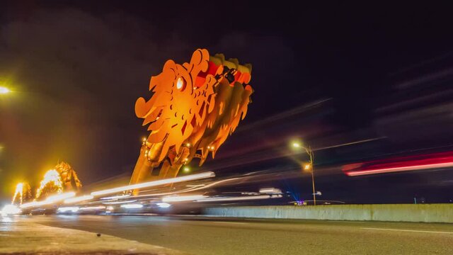 Nightime timelapse of a colourful Dragon bridge in the city of Da Nang in central Vietnam