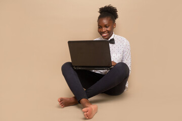 Attractive african woman with laptop 