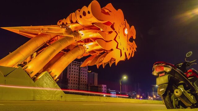 Nightime timelapse of a colourful Dragon bridge in the city of Da Nang in central Vietnam