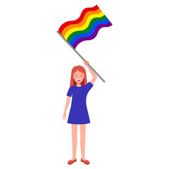 Redhead woman holding rainbow flag taking part in the pride parade.