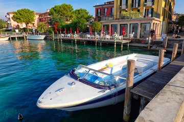 Fototapeta na wymiar Harbour of Sirmione resort, Lombardy, Northern Italy, Europe 