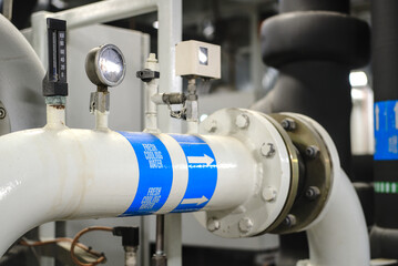 Pressure gauge psi meter in pipe and valves of water, oil and gas system industry 