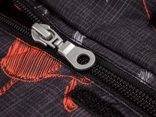 Zipper clothing, lock slider, links and tape with limiters, close-up, macro, structure