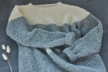 Grey knitted sweater handmade isolated gray backround