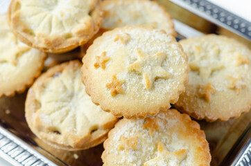 All-butter pastry pies with a mincemeat filling with spiced vine fruits, Christmas cookies