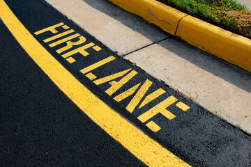 Fire lane painted on the side of a road