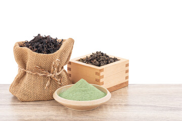 Matcha and Green Tea on wood table isolated on white background with clipping path.