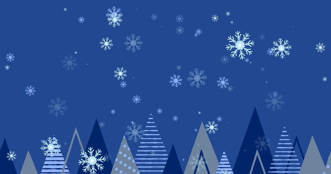 Image of snow falling over fir trees on blue background at christmas