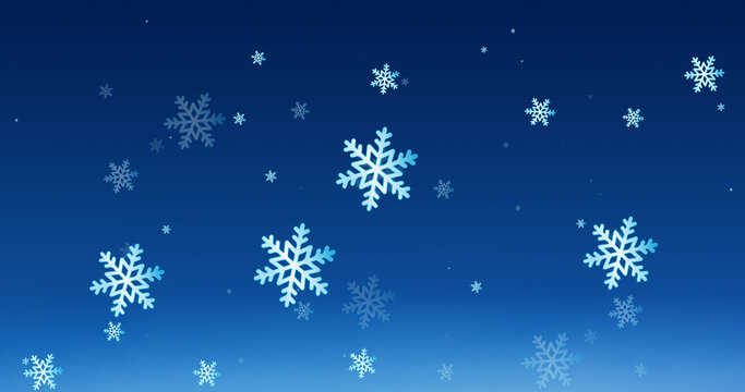 Image of snow falling over blue background at christmas