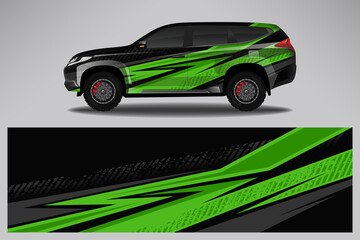 Fototapeta premium Car wrap design race livery vehicle vector. Graphic abstract stripe racing background kit designs for vehicle, race car, rally, adventure and livery