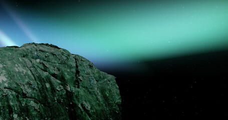 Image of rock at christmas over aurora