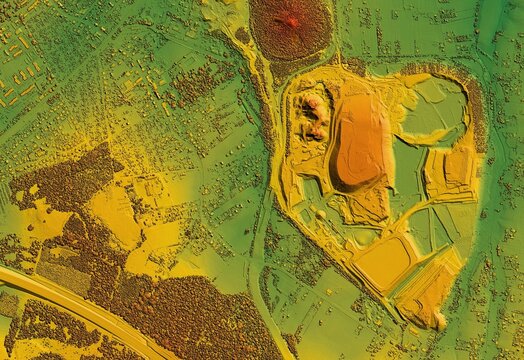 Digital elevation model. GIS 3D illustration made after proccesing aerial pictures taken from a drone. It shows a large opencast mine surrounded by forests and numerous scattered villages