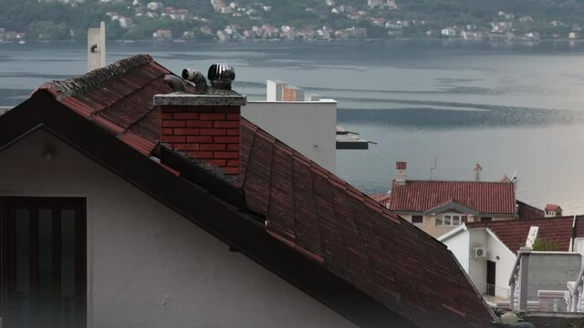 Montenegro tile rooftops of houses with chimneys