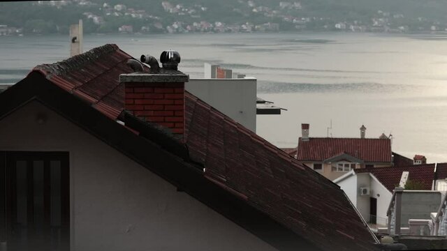 Montenegro tile rooftops of houses with chimneys