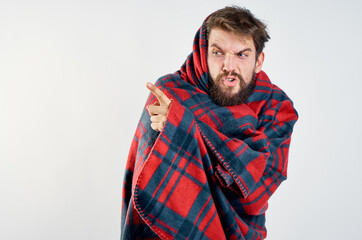 cold man with blanket warming drink health problem