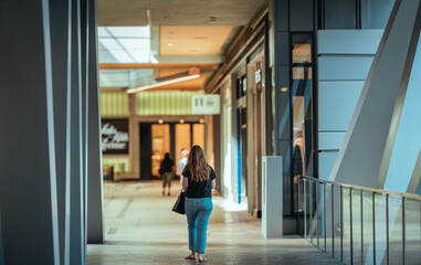 woman walking in the airport shopping 