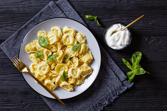 tortelloni with cheese filling on a plate