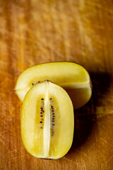 Macro sliced yellow kiwi fruit
