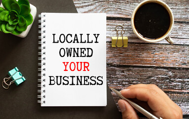 text LOCALLY OWNED YOUR BUSINESS on white paper