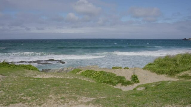 Sea revealed from a Clifftop at Godrevy Beach in Cornwall on a Cloudy Morning near Gwithian